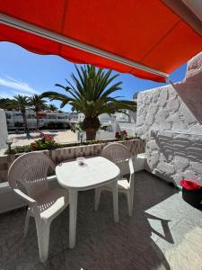 Et opholdsområde på Blue Paradise Apartment