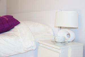 Postel nebo postele na pokoji v ubytování SMM Apartament Stettin