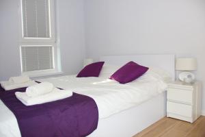 Postel nebo postele na pokoji v ubytování SMM Apartament Stettin