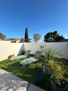 Zahrada ubytování Villas Ambiance 21 Elégance Méditerranéenne à Portiragnes, entre Terre et Mer Villa Helma