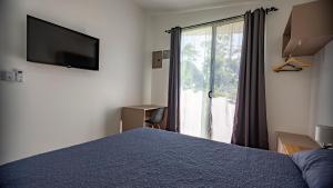Postel nebo postele na pokoji v ubytování Toucan home