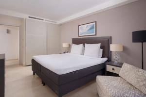 Кровать или кровати в номере Radisson Blu Resort Gran Canaria