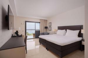 Кровать или кровати в номере Radisson Blu Resort Gran Canaria