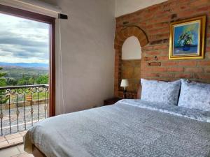 Postel nebo postele na pokoji v ubytování Cabaña en Mirador de Puente Piedra