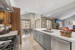 a kitchen with a sink and a counter top at Heber Hideaway Exquisite Home with Hot Tub in Heber City