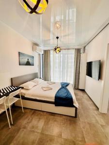 Postel nebo postele na pokoji v ubytování Bliss Apart Hotel Sea View