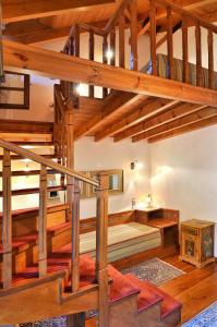 Postel nebo postele na pokoji v ubytování Melinas Boutique Hotel B&B