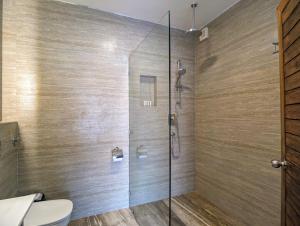 Ein Badezimmer in der Unterkunft Uma Residence and Suites