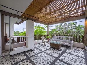 Een balkon of terras bij Ananda's Sanur by ABM