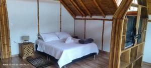 Postel nebo postele na pokoji v ubytování Villa Ester Hostel Vereda Cay