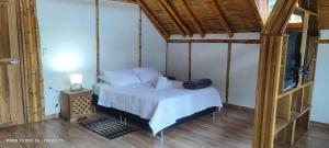 Postel nebo postele na pokoji v ubytování Villa Ester Hostel Vereda Cay