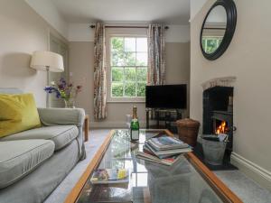 TV a/nebo společenská místnost v ubytování Penwarne Lodge