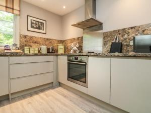 Kuchyň nebo kuchyňský kout v ubytování Penwarne Lodge