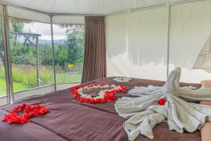 Postel nebo postele na pokoji v ubytování Polestay Glamping Kintamani