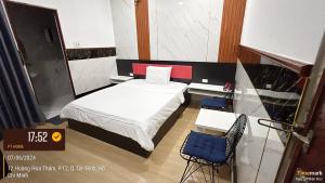 Postel nebo postele na pokoji v ubytování Phúc Khang Hotel Airport
