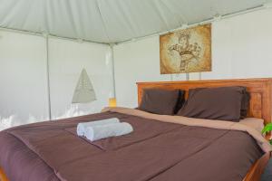 Postel nebo postele na pokoji v ubytování Polestay Glamping Kintamani