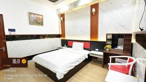 Postel nebo postele na pokoji v ubytování Phúc Khang Hotel Airport