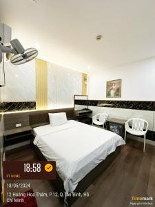 Postel nebo postele na pokoji v ubytování Phúc Khang Hotel Airport