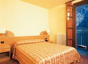 Postel nebo postele na pokoji v ubytování Hotel Bellavista