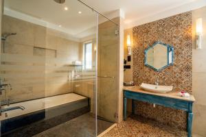 Ένα μπάνιο στο Maravilha Boutique Stay Goa