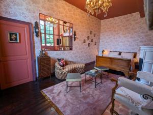 Posezení v ubytování Manoir des Comtes