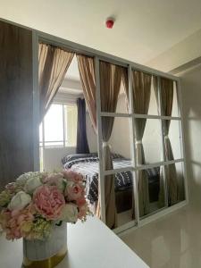 Postel nebo postele na pokoji v ubytování Yvonne Condo at Primeworld Lapu Lapu, Mactan Cebu