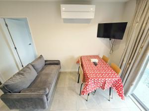 Μια τηλεόραση ή/και κέντρο ψυχαγωγίας στο 3E Apartment