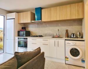 Η κουζίνα ή μικρή κουζίνα στο 3E Apartment +2 φωτογραφίες