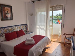 Posteľ alebo postele v izbe v ubytovaní Hotel Matalascañas