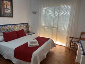 Posteľ alebo postele v izbe v ubytovaní Hotel Matalascañas