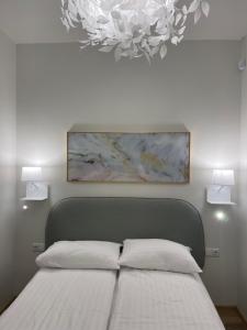 Кровать или кровати в номере Apartamentai su baseinu