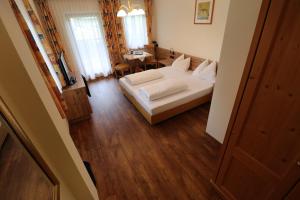 Letto o letti in una camera di Ferienhotel Fuchs