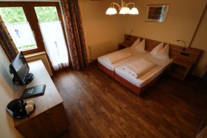 Letto o letti in una camera di Ferienhotel Fuchs