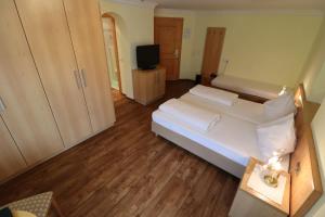 Letto o letti in una camera di Ferienhotel Fuchs