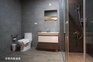 Vannituba majutusasutuses Hoya Hot Springs Resort, Guanziling