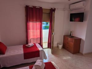 Posteľ alebo postele v izbe v ubytovaní Hotel Matalascañas