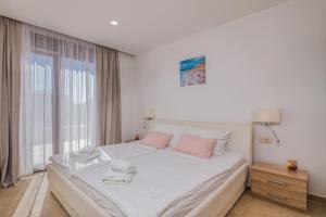 Ένα ή περισσότερα κρεβάτια σε δωμάτιο στο Apartment Villa Cecilia +34 φωτογραφίες