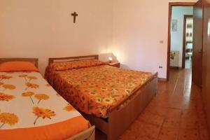 Postel nebo postele na pokoji v ubytování Delizioso appartamento vista mare