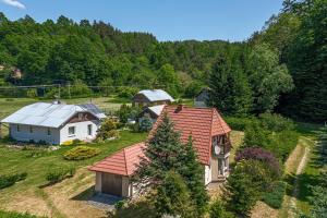 an aerial view of a house in a field at Zielony Zakątek in Łubno
