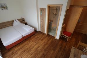 Letto o letti in una camera di Ferienhotel Fuchs
