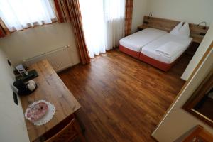 Letto o letti in una camera di Ferienhotel Fuchs