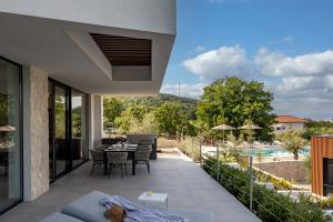 Balkón alebo terasa v ubytovaní Luxusvilla Manatis mit Pool