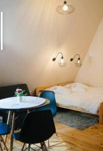 Posteľ alebo postele v izbe v ubytovaní "Miło.Tu" Pokoje Gościnne + 37 fotografií