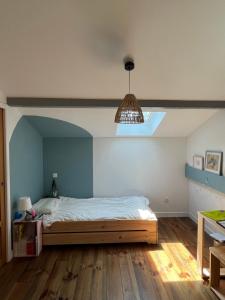 Postel nebo postele na pokoji v ubytování Maison chaleureuse entre pins et ocean + 23 fotografií