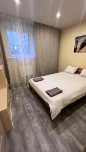 Ένα ή περισσότερα κρεβάτια σε δωμάτιο στο Riverside Promenade apartment M3