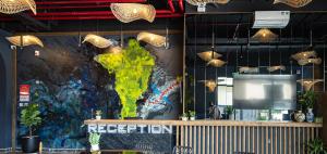 a mural on the wall of a restaurant at TK Phu Quoc Hotel - Grand World Phu Quoc in Phú Quốc