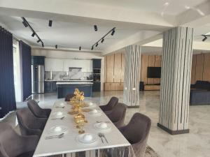 Kuchyň nebo kuchyňský kout v ubytování Вилла