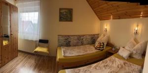Posteľ alebo postele v izbe v ubytovaní Joker Villa Apartmanhaus