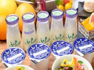 a group of blue and white bottles of milk at Shin Furano Prince Hotel in Furano