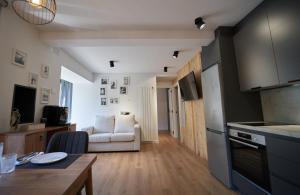 Kuchyň nebo kuchyňský kout v ubytování Apartamentos Casa Nostra